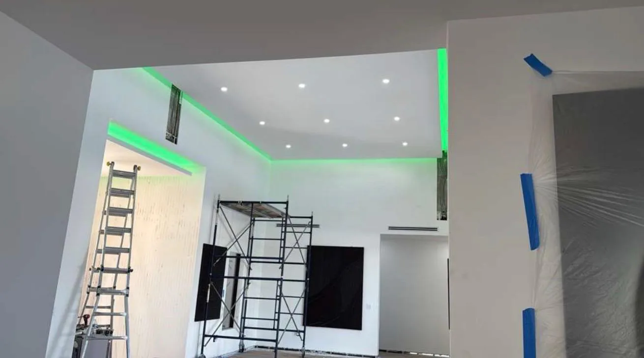 Green cove lighting and recessed ceiling lights in a Miami-Dade interior